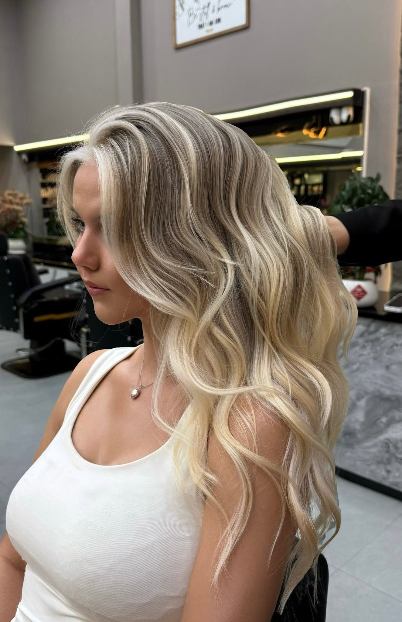 Blonde balayage waves colored at Quoc Phong