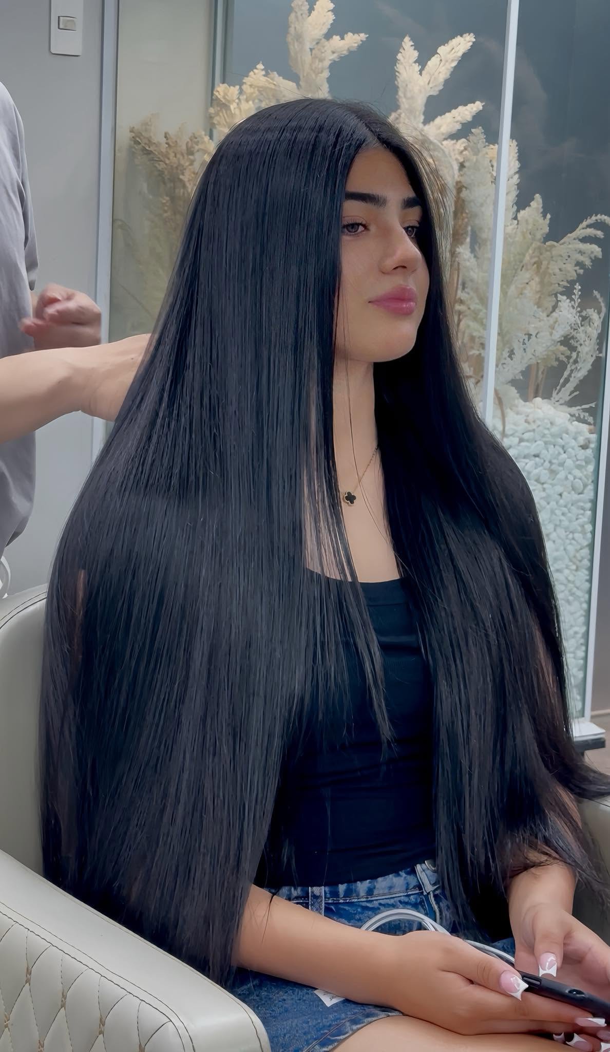 Sleek long black straight hair